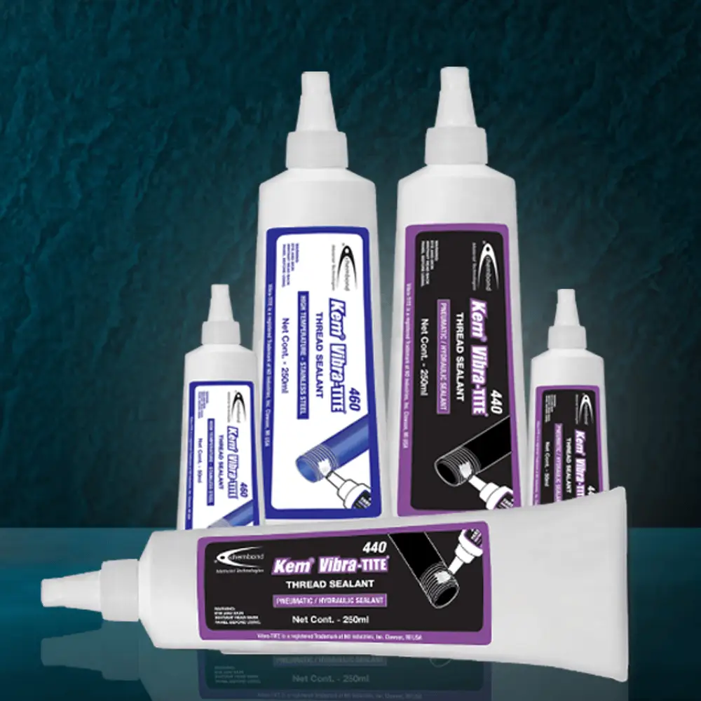 Several white plastic bottles and tubes of Kem Vibra-TITE thread sealant of different sizes are displayed against a dark background.
